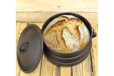 bread baked in a cast iron cooking pot